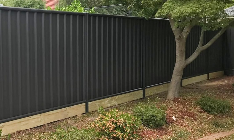 Monument COLORBOND privacy fence in a Canberra backyard