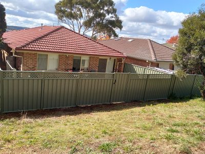 Home with colorbond fencing pale eucalypt